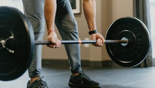 Man lifting weights CrossFit